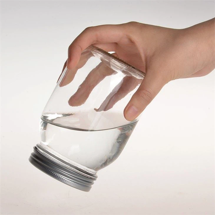 Glass mason jar with screw lid